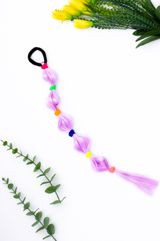 Коси зі штучного волосся на гумках